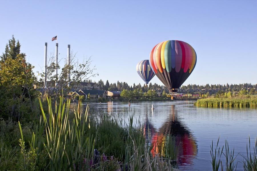 Hot air balloons over the Deschutes River in Bend