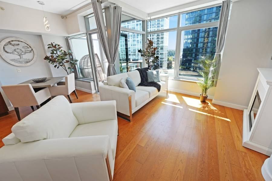 John Ross condo living room with floor-to-ceiling windows over Portland's South Waterfront